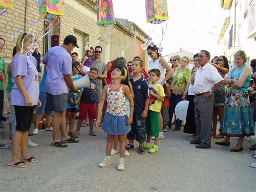 cucañas,carreas de sacos,carreras de bicis